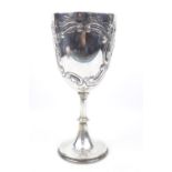 An embossed Silver scroll decorated goblet on spreading base, 21.5cm in Height, Sheffield 1905 by