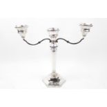 A Silver candelabra with octagonal V shaped stem and three candle holders, 22cm in Height,