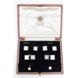 Good quality 9ct Mother of Pearl dress set with belcher link connectors with four matching buttons