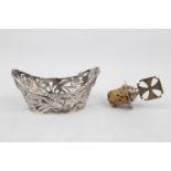 A Silver boat-shaped pierced dish with import mark for 1903 and a Victorian bottle stopper 1882