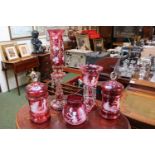 Collection of 20thC Cranberry Mary Gregory style glassware to include 2 Biscuit barrels with lids,
