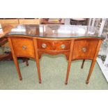 Good quality Mahogany serpentine fronted Sideboard with brass hoop handles over tapering legs with