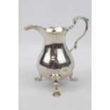18thC Cream jug with leaf capped handle - London possibly 1749. 67g total weight