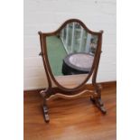 19thC Walnut Shield shaped swing table mirror on curved base