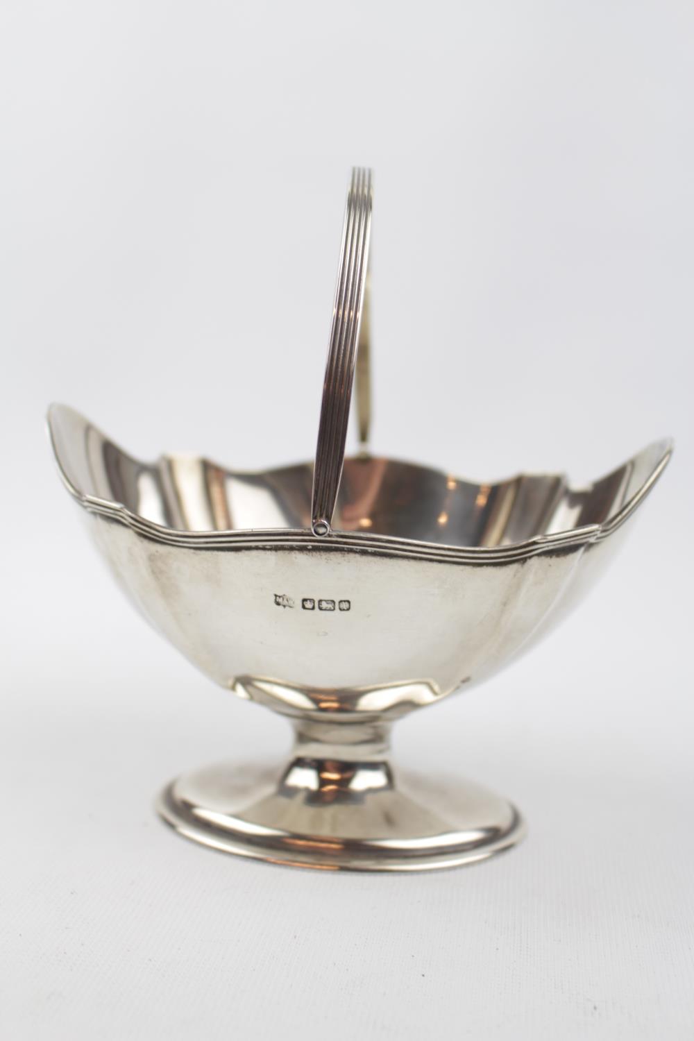 Georgian Style boat shaped sugar basket with swing handle 5'' by Mappin & Webb Sheffield 1915,