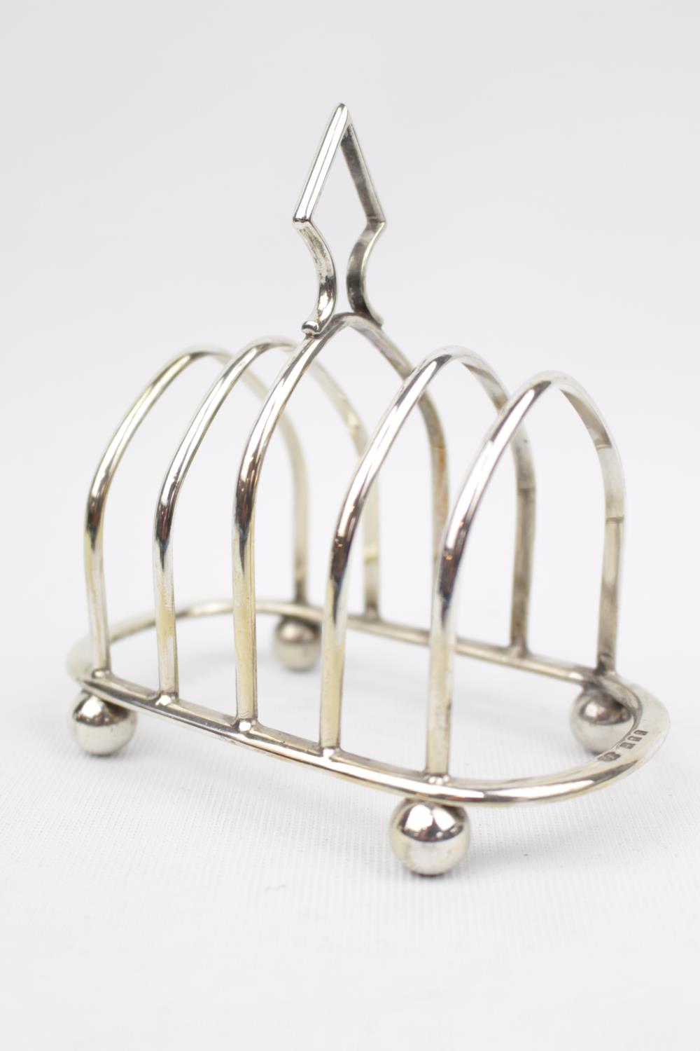 George V Silver Toast Rack of half oval arches by Robert Pringle & Sons, London 1929, 110g total