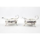 Pair of Silver sauce boats, each on three legs - marks rubbed Chester 1900 by George Nathan & Ridley