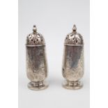 Delicate Pair of Victorian Silver engraved crested pepperettes, London 1849 by Charles Thomas