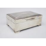 Art Deco Cedar lined Silver cigarette box on bracket feet. 14cm in Width. Birmingham 1939 by Charles