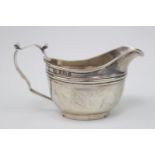 Edward VII Georgian style cream jug of simple twin lined decoration. 12cm in width. Birmingham