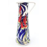 Moorcroft Christmas Bells Ewer. Produced in 2013 of the New Zealand/Australian collection designed