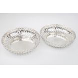 Pair of George V Silver fruit bowls with pierced sides on heavy circular base. 18cm in Diameter.