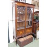 Edwardian walnut glazed display cabinet with panelled doors over long cabriole legs. 91cm in Width