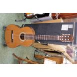 Spanish classical guitar made by Manuel Rodriguez with hard travel case.