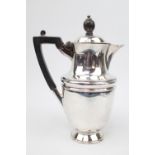 Edwardian Silver Baluster shaped Hot Water Jug with hinged lid and ebonised handle and knop. 18cm in