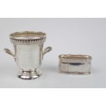 A Interesting American Silver two handled wine cellaret shaped vase stamped Sterling to base and a