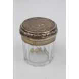 Edwardian Silver topped dressing table powder jar with ribbon and foliate engraved top and