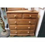 20thC Pine chest of 2 over 3 drawers with turned handles and bracket base
