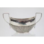 Edwardian half fluted boat shaped two handled sugar bowl. Birmingham 1907 by W J Moyatt & Co. 44g