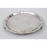 20thC Silver Circular salver on scroll bracket feet. Birmingham 1960 By Viners Limited. 14.5cm in