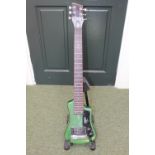 Hafner of Germany Shorty Electric travelling Guitar with original case. In Sparkle green original