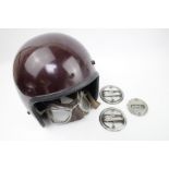 A vintage 1960s Ariel motorcycle Helmet with a pair of Stadium goggles, Ariel & Velocette badges