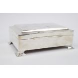 Art Deco Silver Cedar lined Cigarette box on four splayed bracket feet. Birmingham 1930. 14.5cm in