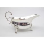 George VI Silver Sauce boat of Georgian Design supported on pad feet. 16cm in Length. London 1940 by