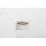18ct Gold 5 stone Diamond ring with carved setting 2.4g total weight