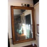 Large 20thC Gilt Gesso framed wall mirror with bevelled glass. 128 x 90cm