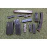 Collection of pistol and machine gun magazines, Sterling, Sten SLR, Webley and Scott automatic