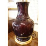 Chinese Vase Lamp base of Red glaze mounted on gesso gilded wooden base. 46cm in Height