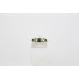 18ct Gold Emerald and Diamond 5 stone ring. Square Cut Emerald flanked by 2 Brilliant Cut Diamonds