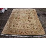Good quality Persian Cream and Green ground rug with tassel ends 310 x 244cm