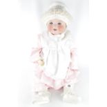 Armand Marseille Bisque headed doll marked 351/6K clothed with extra set of clothing