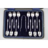 Good quality cased Siler set of 12 Apostle tea spoons with matching sugar tongs by Joseph