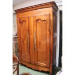 French Walnut Armoire of 2 doors with panelled construction, applied brass engraved door plates over