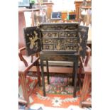 19thC Black japanned wood cabinet on stand with hand painted gold florals spray doors, interior