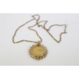 1876 Gold Sovereign in 9ct Gold wreath mount on Figaro chain. 18.9g total weight