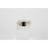 Ladies 18ct Gold Square Cut Sapphire Flanked by 2 Brilliant cut Diamonds in claw setting, Size N.