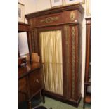 19thC French Armoire with glazed curtain door flanked by applied gilt scroll work decoration.