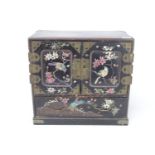 Early 20thC Japanese Black Lacquered Jewellery cabinet with mother of pearl bird decorated panel
