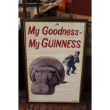 A Guinness advertising poster, after John Gilroy, illustrated with a Hippo and a keeper. 39 x 59cm