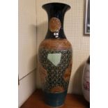 Tall 20thC Chinese Pottery vase with carved panels depicting Dragons a Outcrops. 97cm in Height