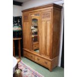 Triple Edwardian panelled wardrobe with mirrored door over 2 drawers and bracket feet