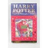 Harry Potter and the Philosophers Stone by J K Rowling paperback signed Warwick Davis Edition