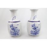 Pair of Chinese Blue and White Character marked lamp bases with Chrysanthemum decoration. 35cm in