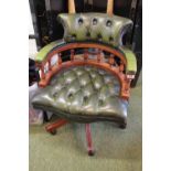 Green Leather Chesterfield Elbow swivel chair with turned supports on casters