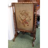 Victorian Walnut Barley twist fire screen with floral inset tapestry over scroll fee