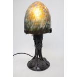 Nancy Daum TIP marked domed lamp with landscape cameo decoration on wrought metal base. 35cm in
